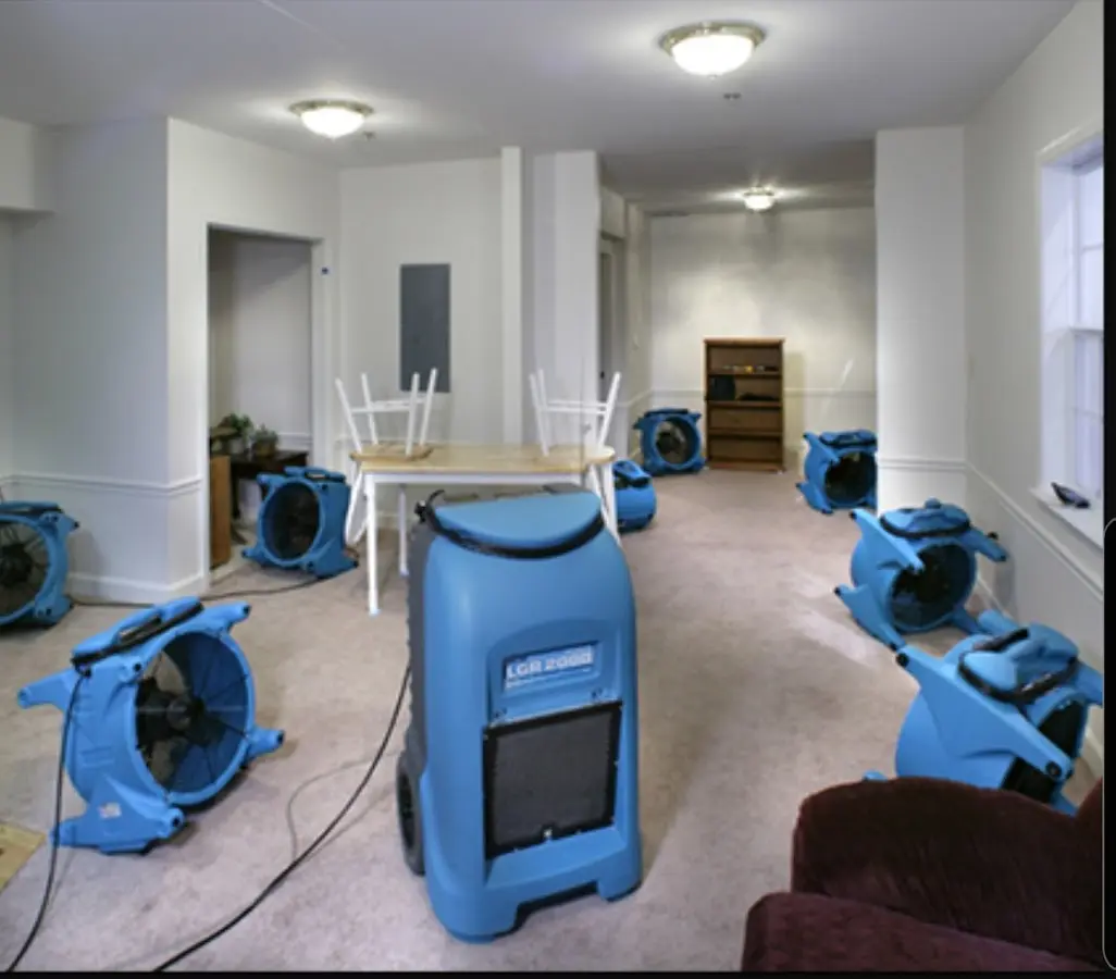 Air movers and dehumidifier setup for Water Damage Restoration in Worth